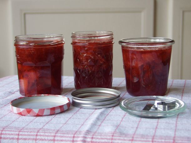 Strawberry jam in 3 different jars